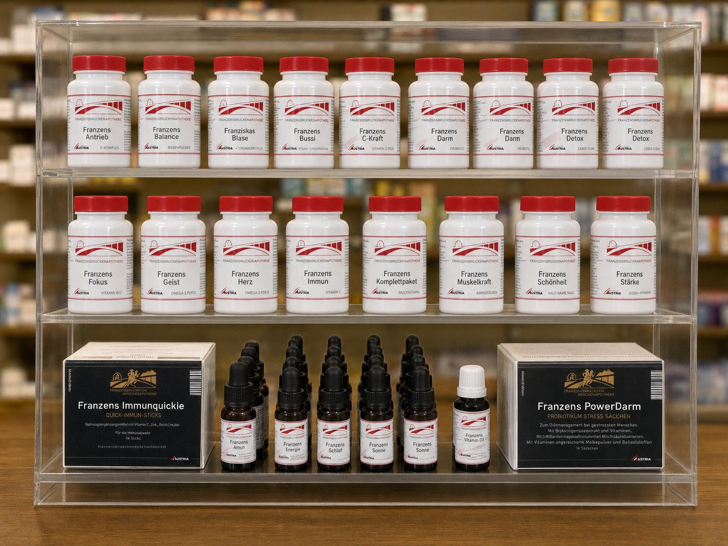 Eigenprodukte der Franzensbrücken-Apotheke in rot-weißer Verpackung